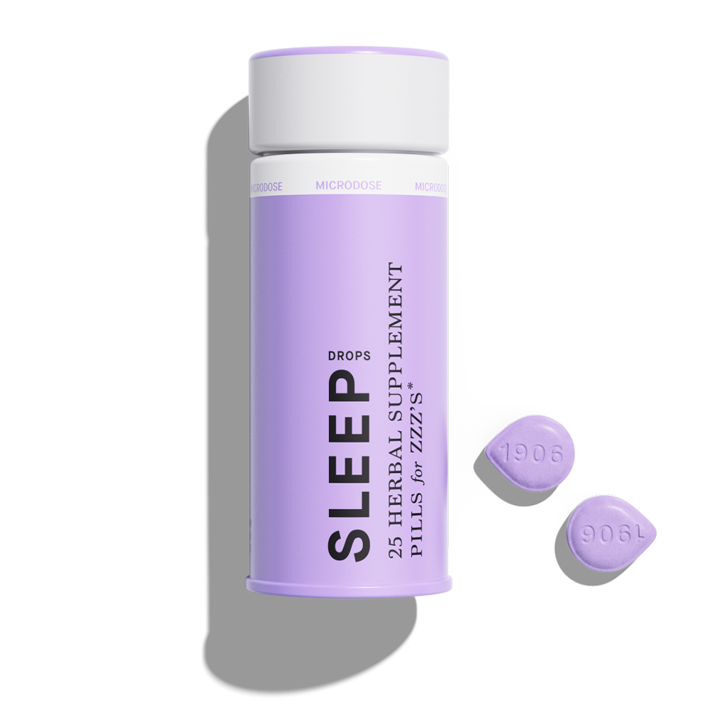 Purple bottle of 1906 Sleep herbal supplement with two pills beside it, designed for restful sleep and relaxation.
