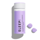 Purple bottle of 1906 Sleep herbal supplement with two pills beside it, designed for restful sleep and relaxation.
