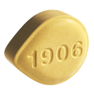1906 Genius is a yellow, oval-shaped edible designed for focus and clarity, made with hemp-based ingredients.