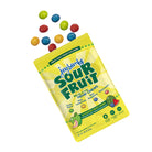 Joy Bombs Sour Fruit hemp chews package with colorful candies scattered around, featuring 2.5mg THC per chew.