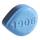 Blue 1906 Chill tablet designed for relaxation, featuring a rounded shape and embossed with the number 1906.