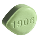 Green 1906 Go tablet, designed for energy and focus, featuring a smooth surface with the number 1906 embossed.